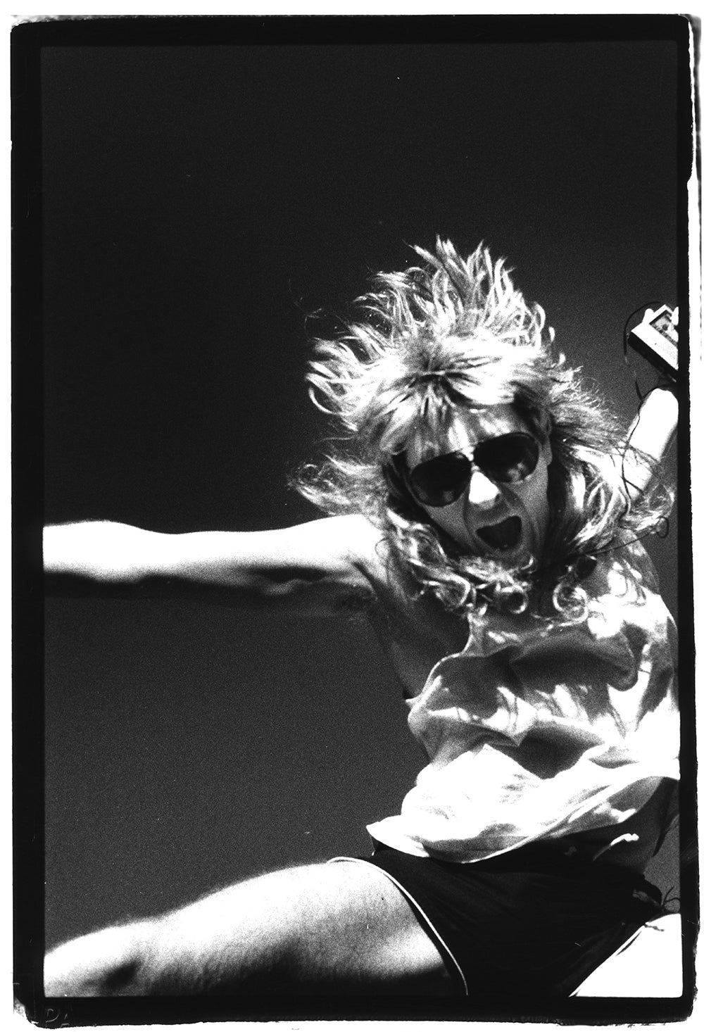 Black and white silver gelatin darkroom portrait of Joe Elliot from Def Leppard in the Netherlands 1987 by Peter Anderson.
